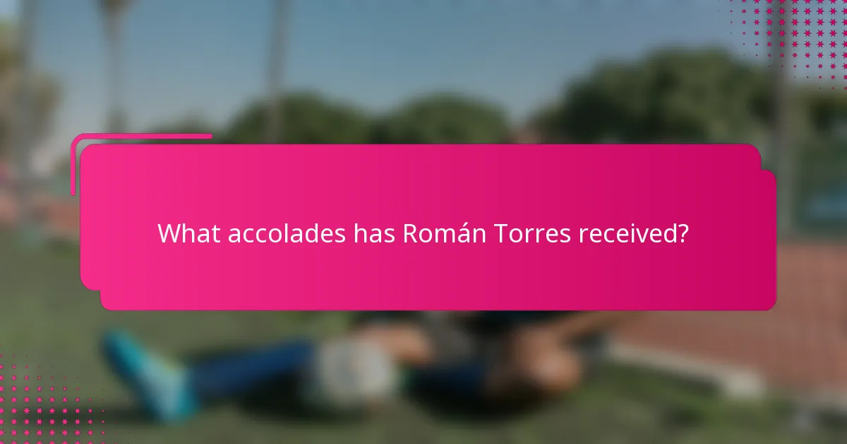 What accolades has Román Torres received?